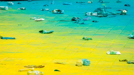 Holi's holiday is over. A lot of trash. The territory is covered with colored powders and garbageの写真素材