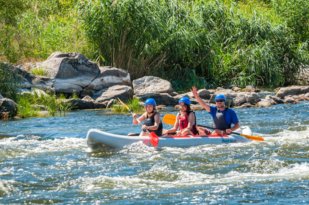 Village Mihia, Mykolayiv region, Ukraine - July 2, 2017: Rafting and kayaking. A popular place for extreme family and corporate recreation as well as training for athletes.のeditorial素材