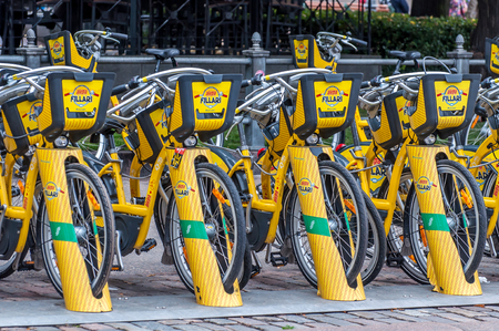 Helsinki, Finland - 4 September 2018: Bicycle rental. Alepa Fillari city bikes parked, waiting for tenantsのeditorial素材