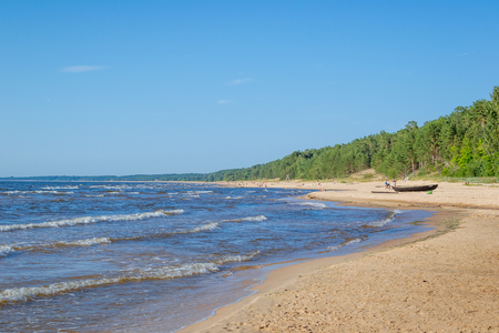 Uncrowded summer beach on the shores of the cold Baltic Seaの写真素材