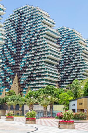 China, Hainan, Sanya - May 14, 2019: Sanya Beauty Crown Hotel. Nine 32-storey houses built in the form of large trees.のeditorial素材
