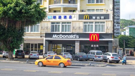 Sanya, Dadonghai Bay, Hainan, China - 16 May, 2019: View of the local McDonald's store located on the street Yuya Road. American fast food company networkのeditorial素材