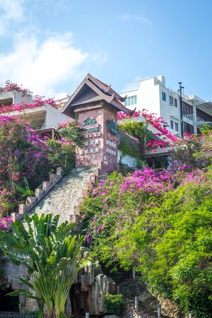 Sanya, Dadonghai Bay, Hainan, China - 16 May, 2019: View of Guesthouse International Hotel from the street Yuya Road.のeditorial素材