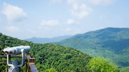 The mountains are covered with impassable tropical forests, jungles. Cultural Tourism Zone Hainan island, Yalong Bay Tropical Paradise Forest Park Yanoda. View from the observation deck.の写真素材