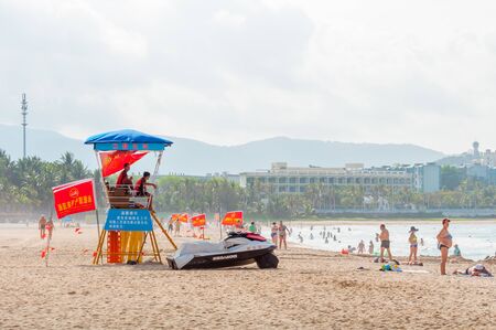 Sanya, China - May 15, 2019: Surveillance tower on the beach. A lifeguards sitting on lifeguard tower front of the sea and oversees order and the safety in the waterのeditorial素材