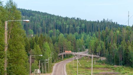 Finland - August 1, 2018. Ukkohalla Ski Resort is located in Central Finland, the Kainuu region. Information sign at the entrance to the ski resort of Ukkohalla. The inscription Welcome in Finnishのeditorial素材