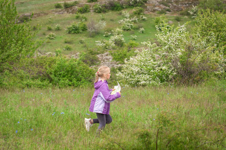Village of Aktovo, Ukraine - May 21, 2021: Orienteering race. Traditional annual orienteering game Partisan Spark Cup 2021. Athletes during orienteering trailのeditorial素材