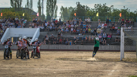 Voznesensk, Ukraine - September 27, 2015: Motoball. Episode of the Ukrainian Championship match between the teams Voskhod (Voznesensk) - Druzhba (Machukhi).のeditorial素材
