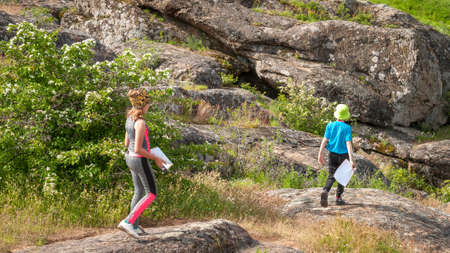 Village Aktovo, Ukraine - May 21, 2021: Orienteering race. Traditional annual game. Young athlete during orienteeringのeditorial素材