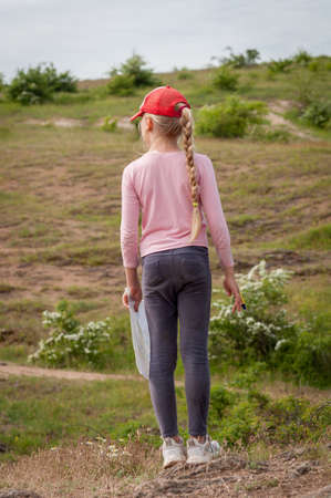 Village Aktovo, Ukraine - May 21, 2021: Orienteering race. Traditional annual game. Young athlete during orienteeringのeditorial素材