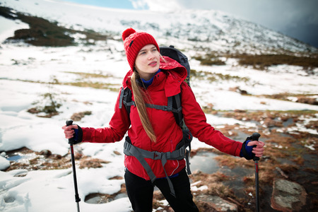 Shot of a young woman looking at the landscape while hiking in the mountains Lifestyle hiking conceptの写真素材