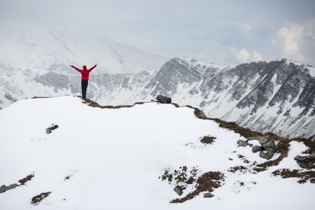 Traveler relaxing outdoor with rocky mountains on background Lifestyle hiking conceptの写真素材