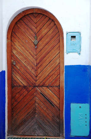 Traditional and artisanal door in Moroccoの写真素材