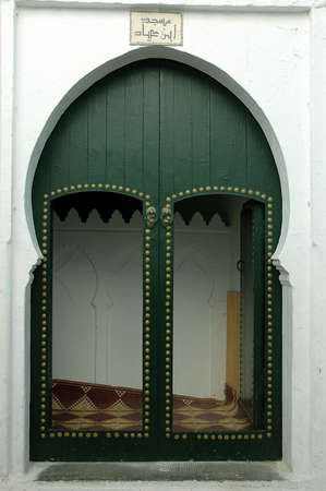 Traditional and artisanal door in Moroccoの写真素材