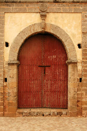 Traditional and artisanal door in Moroccoの写真素材