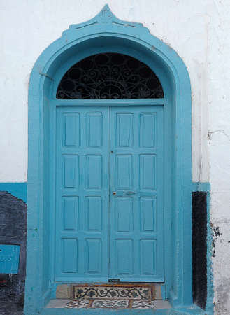 Traditional and artisanal door in Moroccoの写真素材