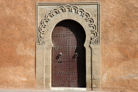 Traditional and artisanal door in Moroccoの写真素材