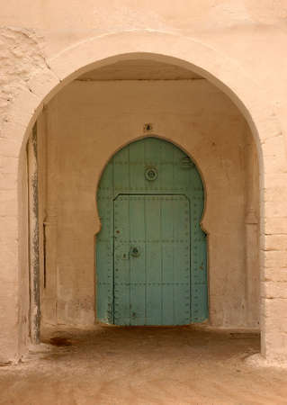 Traditional and artisanal door in Moroccoの写真素材