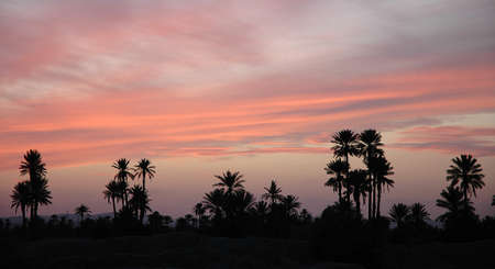 Beautiful sunset with beautiful reflection on the ocean in Moroccoの写真素材