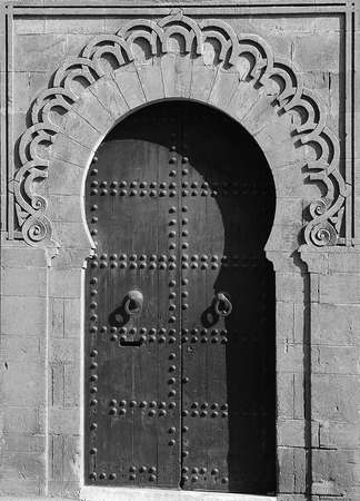 The traditional and handcrafted door in Morocco in black and whiteの写真素材