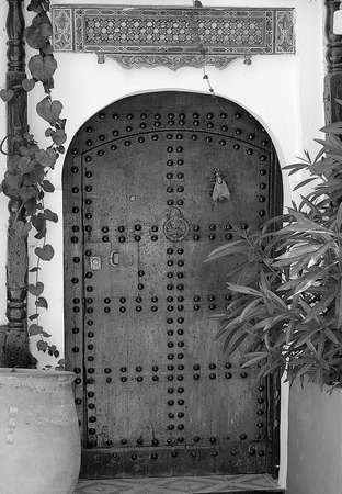 The traditional and handcrafted door in Morocco in black and whiteの写真素材