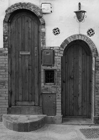 The traditional and handcrafted door in Morocco in black and whiteの写真素材