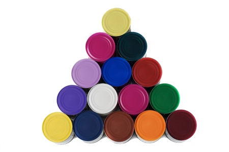 Pyramid of tin painted colorful cans isolated on a white background の写真素材