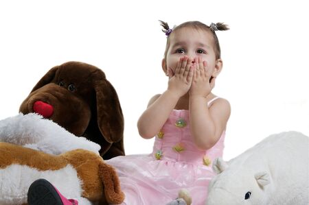 Beautiful and smilling child with toy brown and white bears isolated against white の写真素材