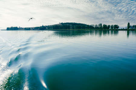 View of the Polvese Island, Lake Trasimeno, Umbria, Italyの写真素材
