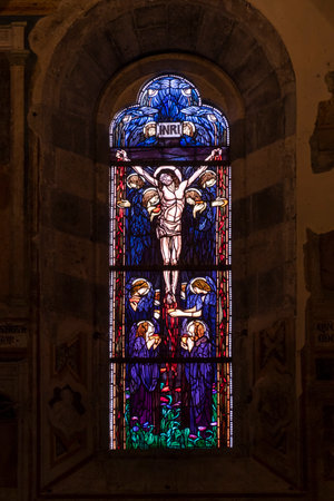 Stained glass window with religious scene showing Jesus with angels, Orvieto Cathedral, Perugia, Umbria, Italy.のeditorial素材