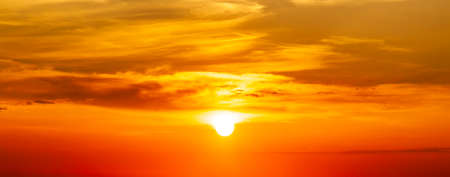 Setting sun in the orange sky. No land view.の写真素材