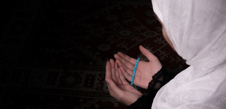 Girl pray in darkの写真素材