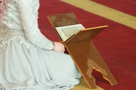 Reading Quran in mosqueの写真素材