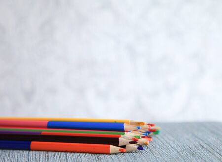 Colored watercolor pencils paint a rainbow. Creationの写真素材