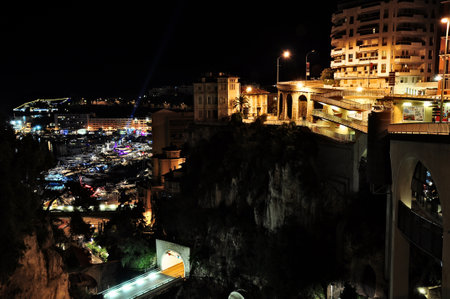 Night city view, fashionable yachts come to port Hercules on May 24, 2012, Monaco       のeditorial素材