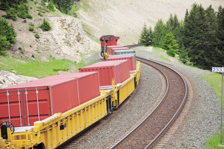 Long freight train in Canadian rockies  の写真素材