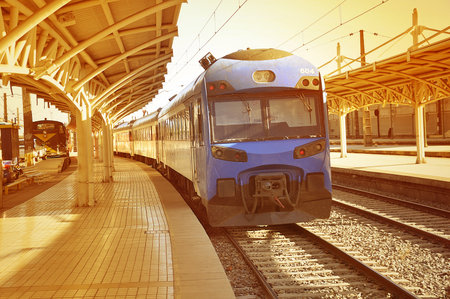 Train of TerraSur company departs from central railway station at sunset on February 20, 2013 in...