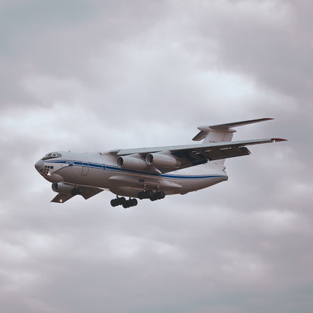 Flight of the plane IL-76MD in the stormy sky on September 09, 2014 in Sheremetjevo, Russia.のeditorial素材