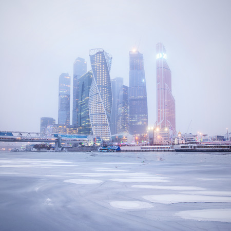 Winter view of the business center under the snowfall and fog. Moscow. Russia.の写真素材