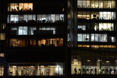 Windows of the offices and the fitness center in the skyscraper in Moscow city district, Moscow, January 16, 2015.のeditorial素材