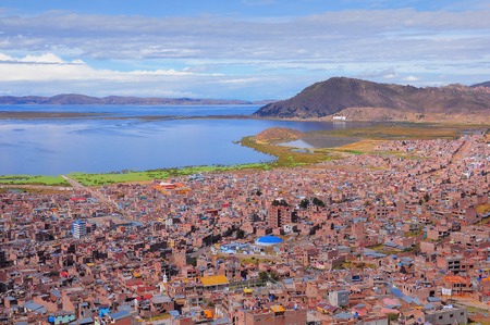 Breathtaking view of Puno by Titicaca lake. Peru. Lake Titicaca is the largest lake in South America and the highest navigable lake in the world.の写真素材