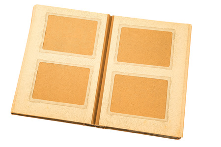 Open old photo album on white background.の写真素材