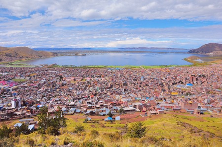 Breathtaking view of Puno by Titicaca lake. Peru. Lake Titicaca is the largest lake in South America and the highest navigable lake in the world.の写真素材