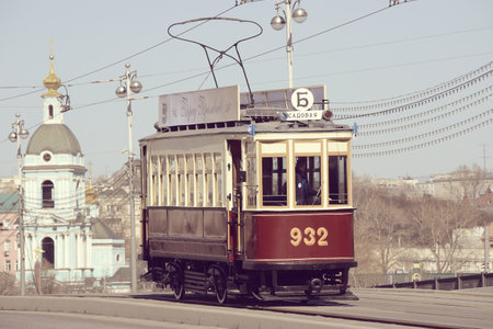 MOSCOW, RUSSIA - APRIL 11, 2015: Vintage tram goes to the depot on the empty city street of Moscow, Russia, April 11, 2015.のeditorial素材