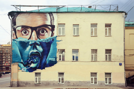 MOSCOW, RUSSIA - JULY 7, 2015:  Abstract graffiti on the wall of the old house, Moscow, Russia, July 7, 2015.のeditorial素材