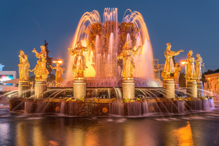 Moscow, Russia - August 1, 2015: Fountain Friendship of Nations in the evening, VDNKh All-Russia Exhibition Centre.のeditorial素材