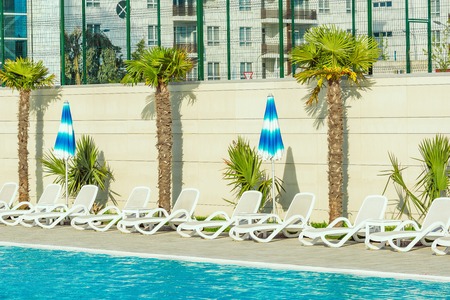 Luxury swimming pool in the hotel on the tropical sea resort.の写真素材