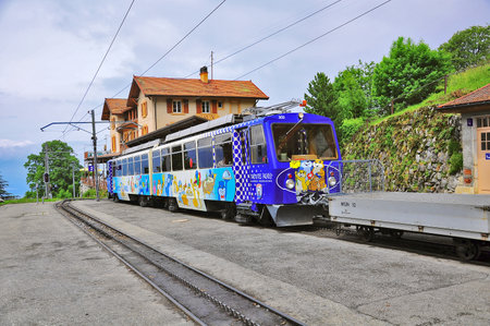 Caux, Switzerland - June 15 2010: Passenger cogwheel train from Montreux to Haut-de-Caux stands by...