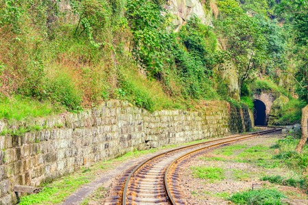 Tunnel and steam narrow-gauge railway from Yuejin to Bagou in the jungle. Jiayang Mining Region. Sichuan province. Chinaの写真素材