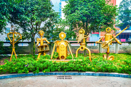 Yuejin, Jiayang Mining Region, Sichuan province, China, November 05, 2016: Art object of the orchestra made from the metal machine parts.のeditorial素材